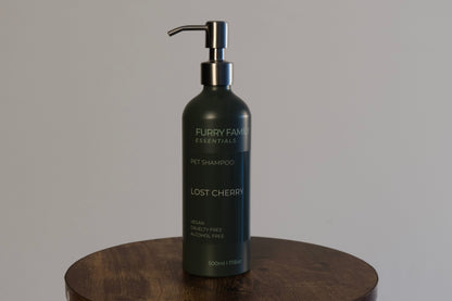 Pet shampoo bottle labeled &